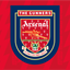 Arsenal logo with 'The Gunners' text on a red background