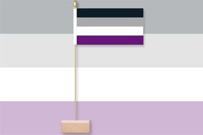 Asexuality flag on a stand against a gray and purple background