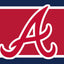 Logo of the Atlanta Braves on a red and blue striped background