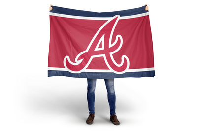 Person holding a large red flag with a white 'A' logo on a white background