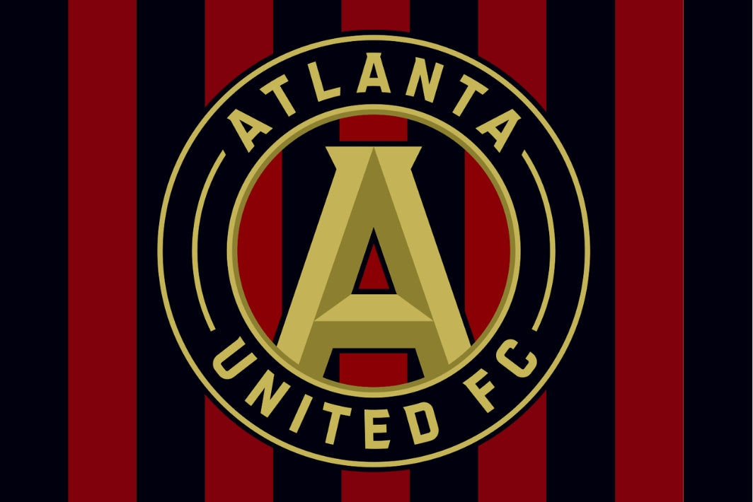 Atlanta United FC logo on a red and black striped background