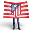 Person holding a large flag with atletico de madrid crest on a white background