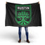 Person holding a black flag with Club Internacional de Fõtbol Miami logo
