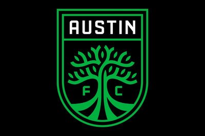 Green logo of Austin FC with a tree design on a black background