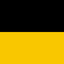 The flag of Baden-Württemberg. A black and yellow horizontal bicolor flag waving on a white flagpole against a plain white background.
