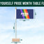 Pride month table flag with rainbow design and text on a blue background. Be Yourself Pride Month