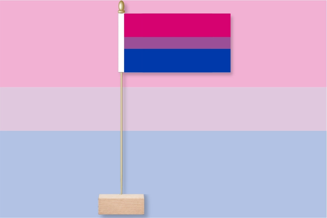 Bisexual pride flag on a pink and blue background