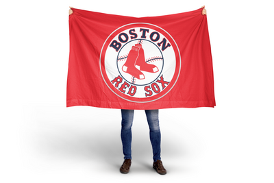 Person holding a Boston Red Sox flag on a white background