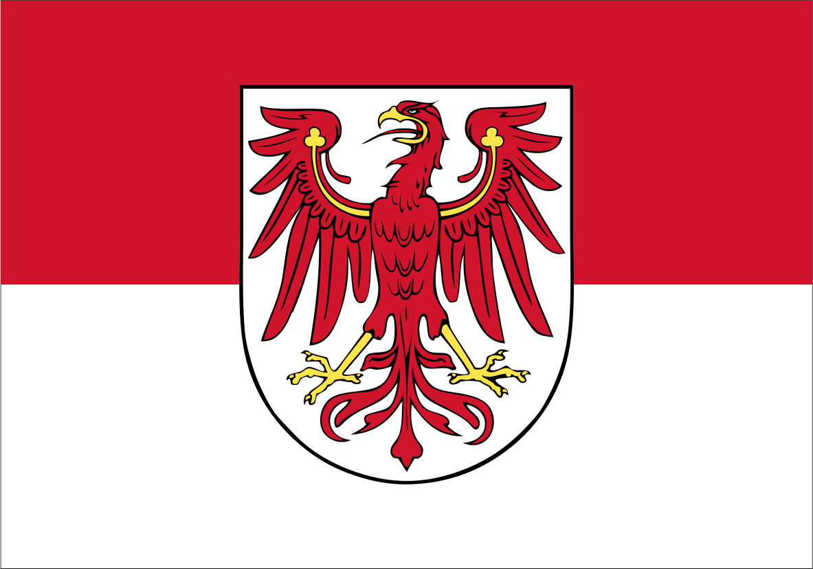 Brandenburg State Flag. The flag of the Free City of Berlin, Germany, featuring a horizontal bicolor of red and white with a white shield in the center containing a red eagle with gold details.