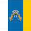 The flag of the Canary Islands is a vertical tricolour of three equal stripes—white, blue, and yellow—officially adopted in 1982. It is used as a vertical tricolour (white, blue, and yellow) often featuring the coat of arms in the center. The design combines colors from the provinces of Tenerife and Las Palmas.