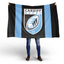 someone holding a Cardiff Rugby Flag since 1876 black and blue