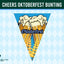 A triangular Oktoberfest-themed bunting flag design centered on a light blue and white harlequin patterned background, with a dark green header reading 'CHEERS OKTOBERFEST BUNTING' and a small 'Flags Ireland' mark in the lower left.