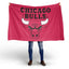 Person holding a Chicago Bulls red flag on a white background