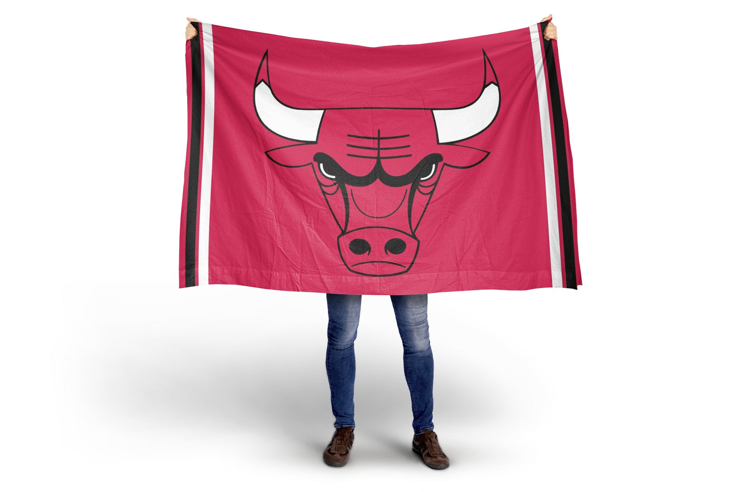 Person holding a large red flag with a bull logo on a white background