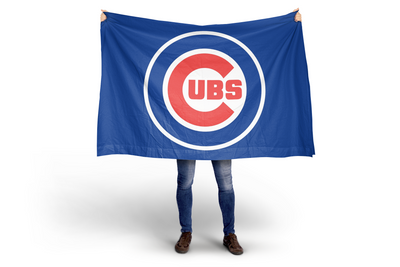Person holding a large Chicago Cubs flag on a white background