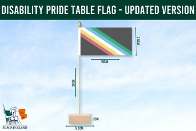 Disability pride table flag with dimensions and Flags Ireland logo on a blue background