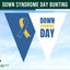 Down Syndrome Day bunting with blue and yellow ribbon on a blue sky background