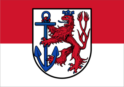 Dusseldorf Flag. A heraldic shield featuring a red lion rampant with a blue crown and blue anchor, centered on a white field, with a red and white horizontal bicolor background.