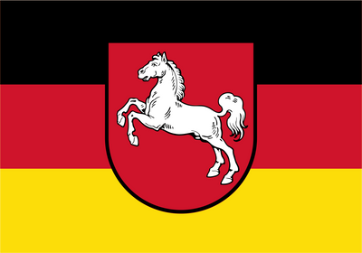 German Lower Saxony flag design with horizontal black, red, and yellow bands and a red shield containing a white horse emblem centered on the flag.