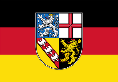 German Saarland State flag with horizontal black, red, and yellow stripes and a central shield containing four quadrants with heraldic lions and a red cross.