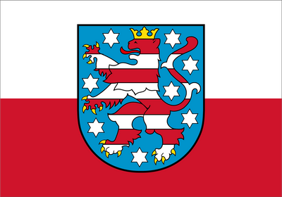 Thuringia State Flag red and white horizontal bicolor flag with a central heraldic shield showing a red lion rampant on a blue field with white stars and a gold crown.