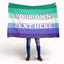 Person holding a gay men flag with customizable text in a rainbow pattern on a white background