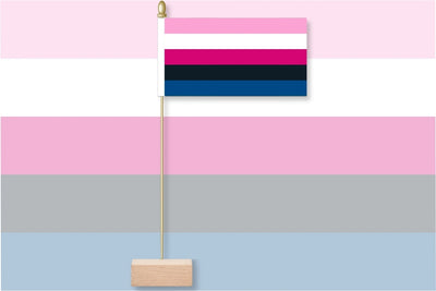 Flag with pink, blue, and black stripes on a striped background. Genderfluid Table Flag.