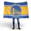 Person holding a Golden State Warriors flag on a white background
