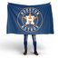 Person holding a Houston Astros flag on a white background