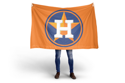 Person holding an orange flag with a logo featuring a large white 'H' on a white background