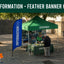  information booth with a feather banner in an outdoor setting