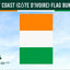 Ivory Coast flag bunting with a green header strip at the top, white text reading 'IVORY COAST (CÔTE D'IVOIRE) FLAG BUNTING,' and a vertical tricolor flag in orange, white, and green centered on a pale blue sky background. A small 'Flags Ireland' logo appears in the lower left.