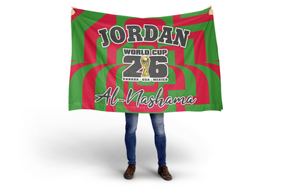 Person holding a large green and red flag with text and logos.
