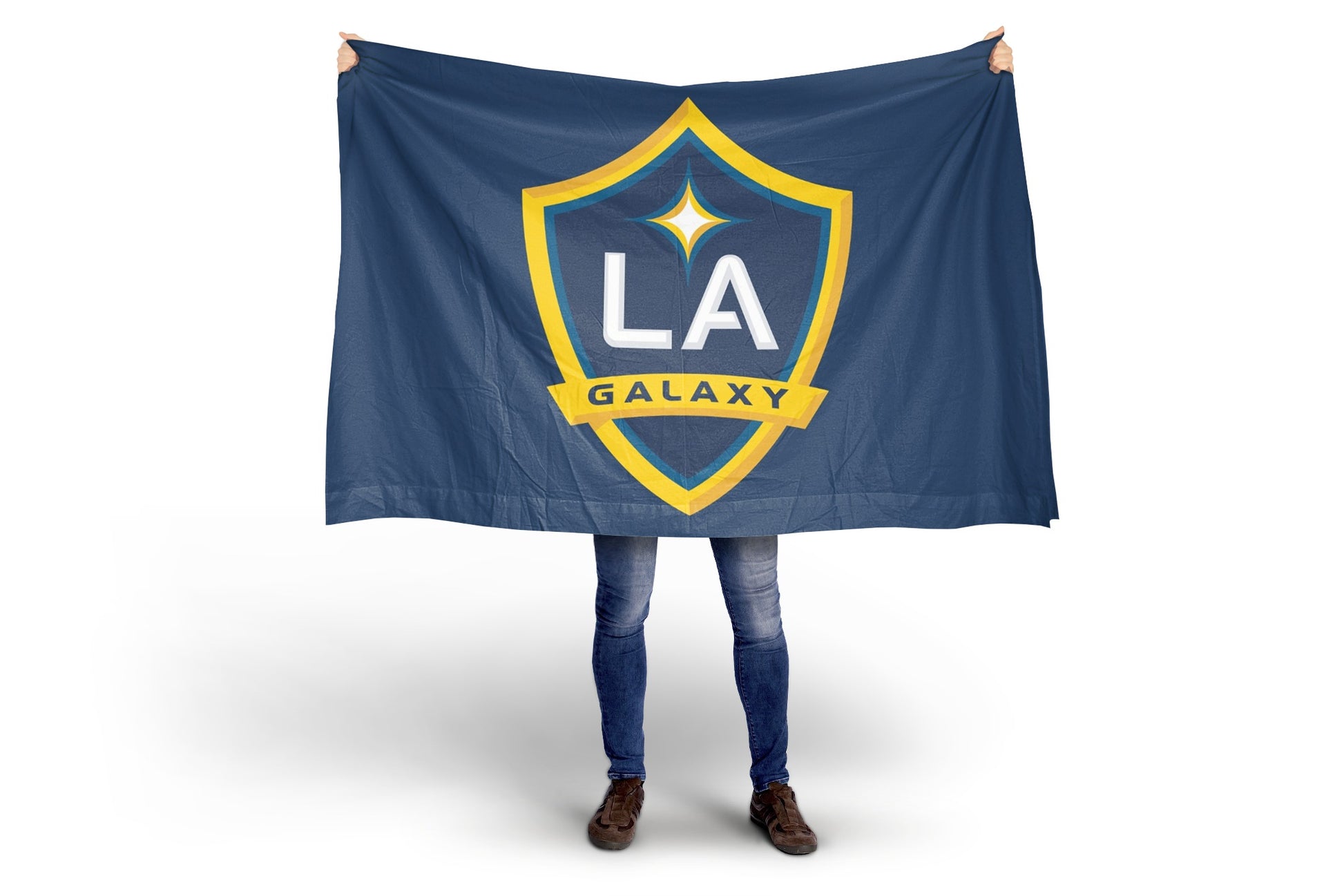 Person holding a LA Galaxy flag on a white background