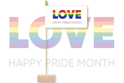 Pride-themed decoration with rainbow colors and 'LOVE' text on a white background. LOVE - Happy Pride Month