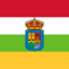 Flag with a coat of arms in the center, featuring red, white, green, and yellow horizontal stripes.