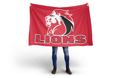 someone holding Lions logo Red background