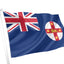 New South Wales Flag flying on a white background