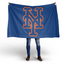 Person holding a blue flag with an orange logo on a white background