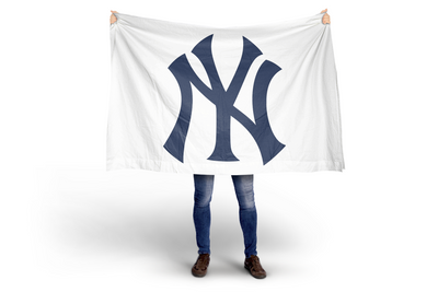 Person holding a white flag with a blue logo on a white background