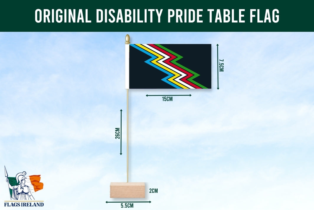 Disability pride table flag with measurements and Flags Ireland logo on a blue background