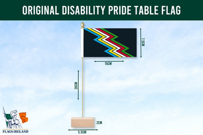 Disability pride table flag with measurements and Flags Ireland logo on a blue background
