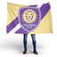 Person holding a Orlando City soccer team flag with a lion emblem on a white background
