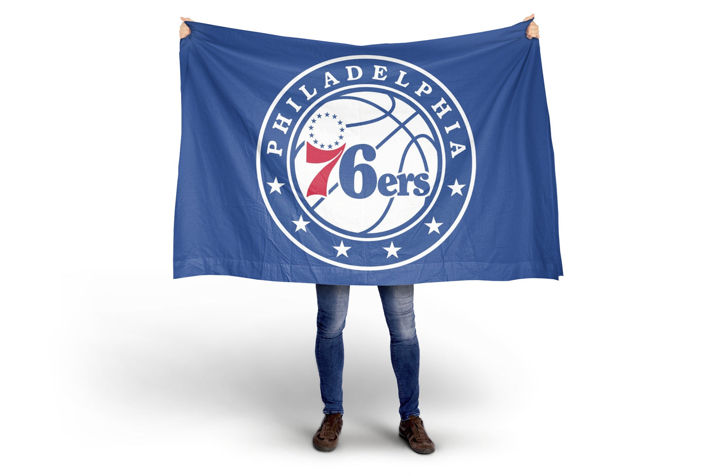 Person holding a Philadelphia 76ers flag on a white background