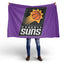 Person holding a Phoenix Suns flag with a white background