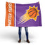 Person holding a Phoenix Suns flag with the team's logo on a white background