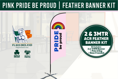 Pink feather banner with 'Pride be proud' text and Flags Ireland branding.