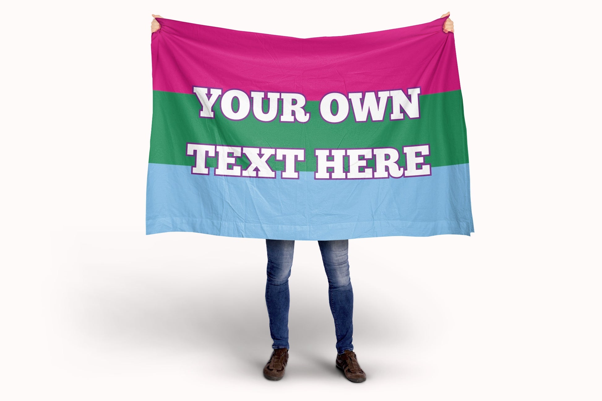 Person holding a polysexual flag with customizable text on a white background