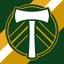Logo with a white axe on a green and gold striped background. Portland Timbers FC Stripes Flag.