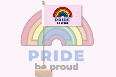 Decorative item with rainbow design and 'PRIDE be proud' text on a white background. Pride - Be Proud